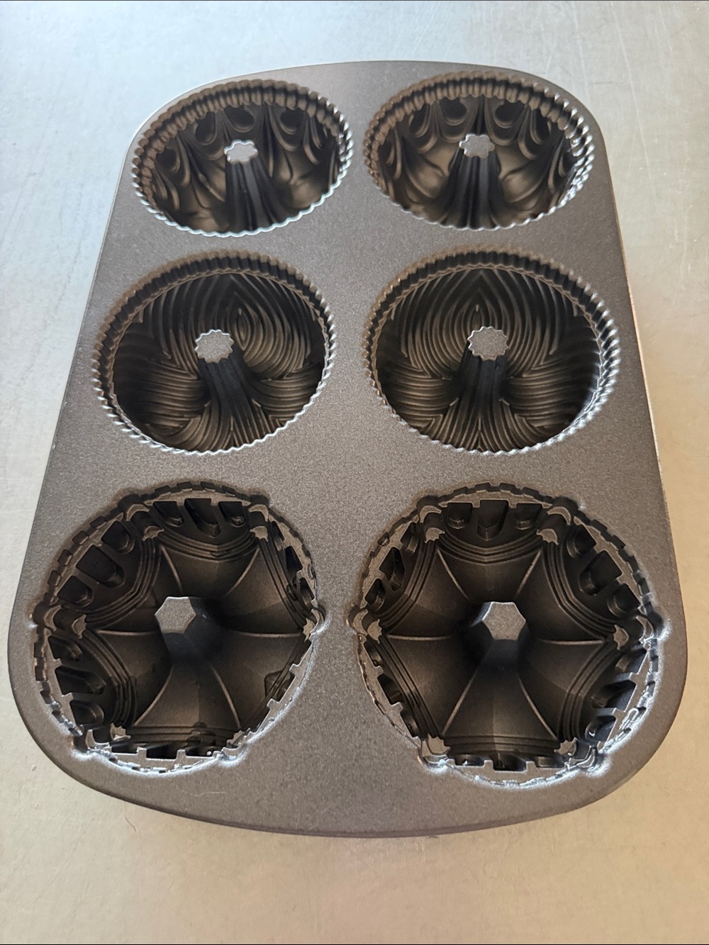 Nordic Ware Nonstick Crown Bundtlette Pan in Dark Gray